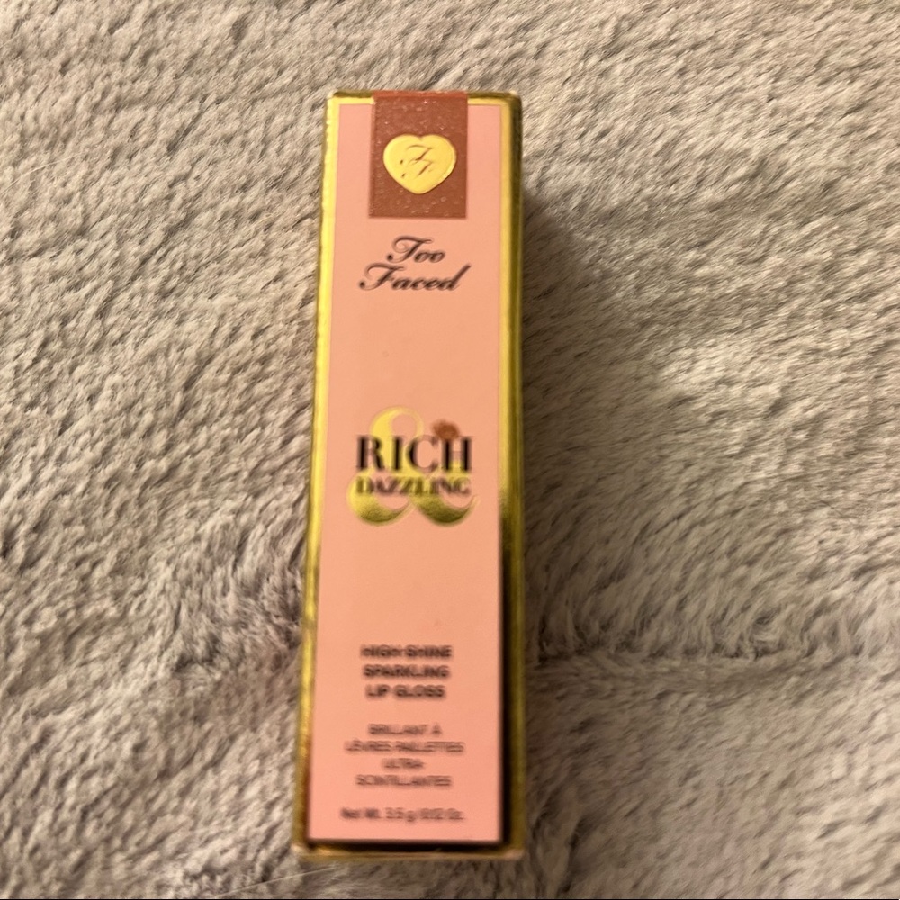 Too faced Never used brand-new lip gloss in color: sunset